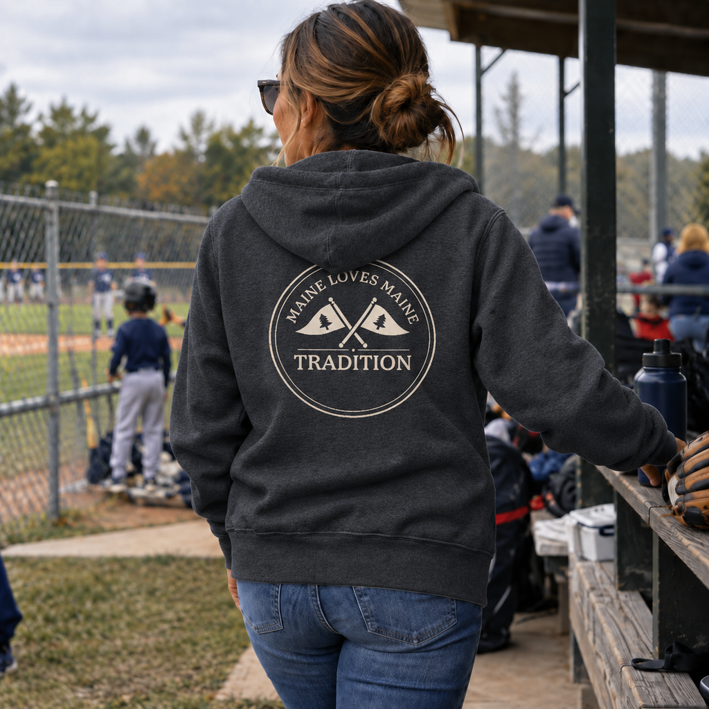 Maine Loves Maine Tradition Zip Hoodie in Charcoal Heather with Vintage White Tradition back graphic, female baseball-field lifestyle