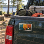 Windowpanes of Camp sticker on a generic pickup truck loaded with camping gear