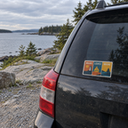 Windowpanes on the Water sticker on the rear window of a car near the Maine coast