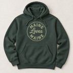 The Harbor Hoodie in Heather Forest with sage Maine Loves Maine circle logo, flat lay